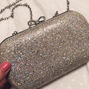 Claire’s Silver Iridescent Clutch Purse
